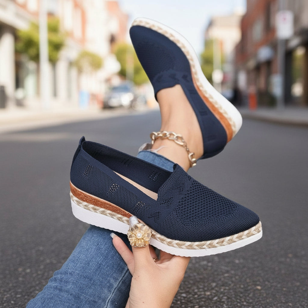 Women’s Woven Rope Platform Snakeskin Pointed-Toe Flats | Trendy Flats displayed on street with platform sole and pointed toe.