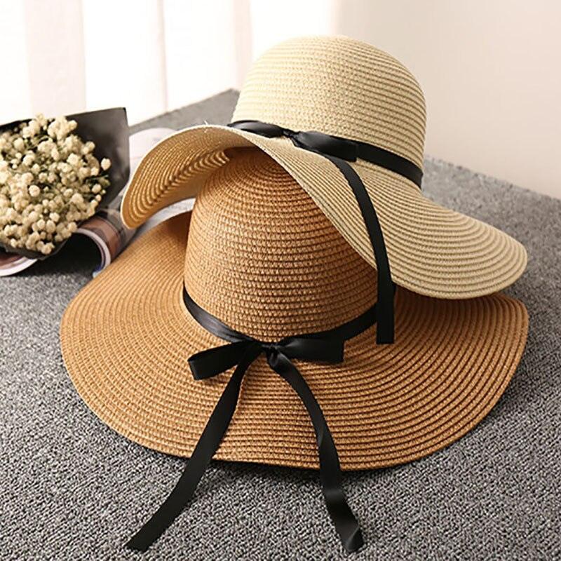 La Dolce Vita Straw Hat - Stylish Italian Summer Sun Hat with Ribbon Tie in two colors on display table.