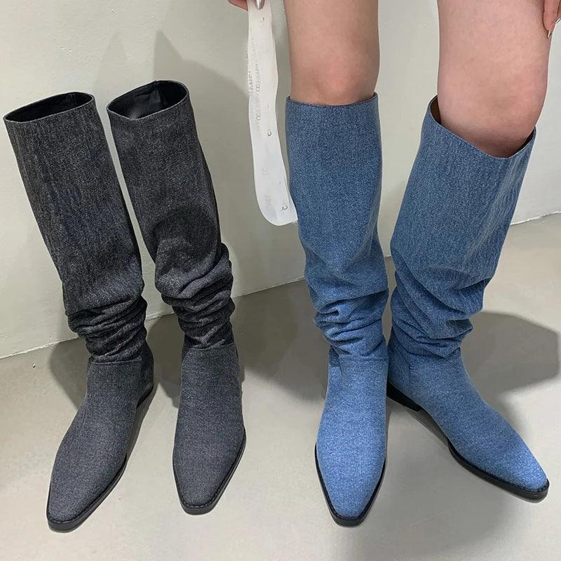 Women’s Denim Knee High Boots - Casual Cowboy Style; black and blue denim boots displayed on a woman’s legs, stylish cowboy design.
