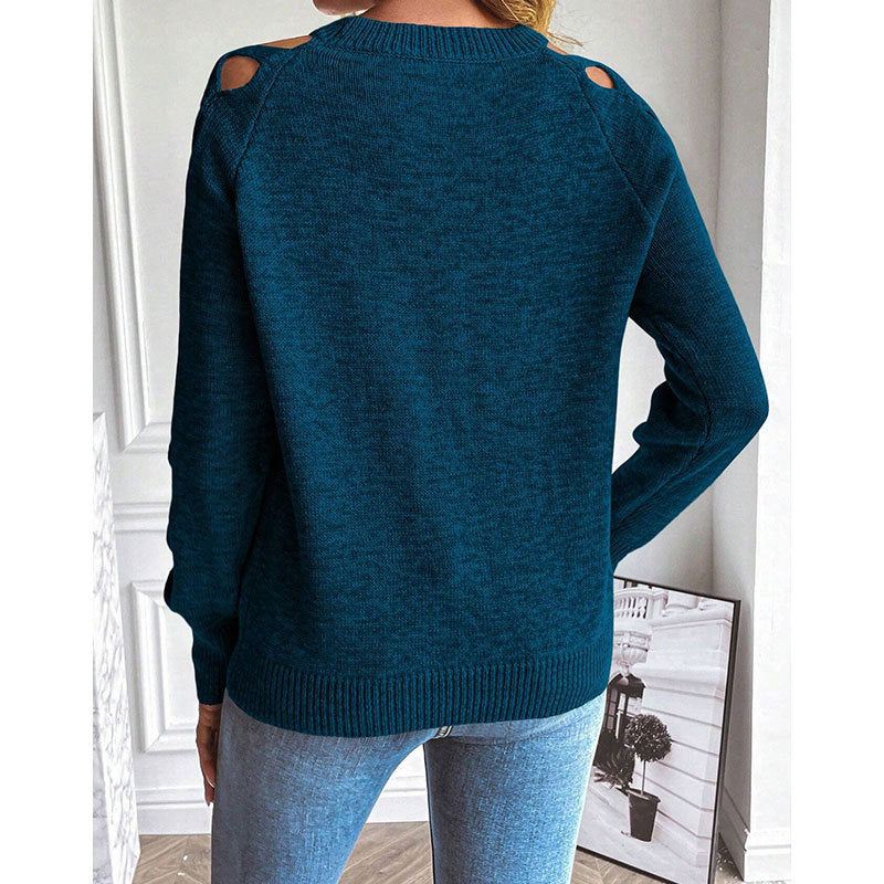 Woman wearing Women's Casual Long Sleeve Hollow Out Sweater in blue with trendy openwork design in a cozy setting.