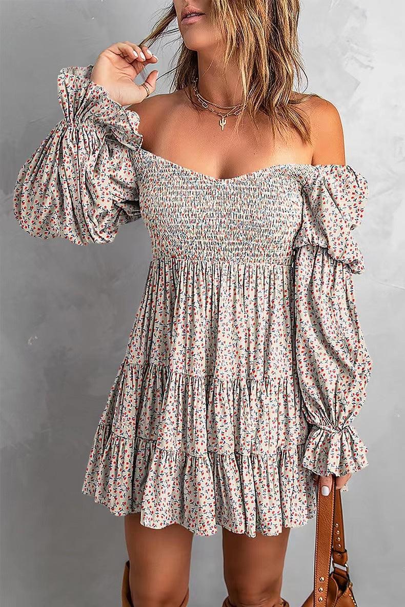 Woman wearing Flirty Puff Sleeve A-Line Dress, Spring & Summer Strapless Dress with floral pattern, gray background.