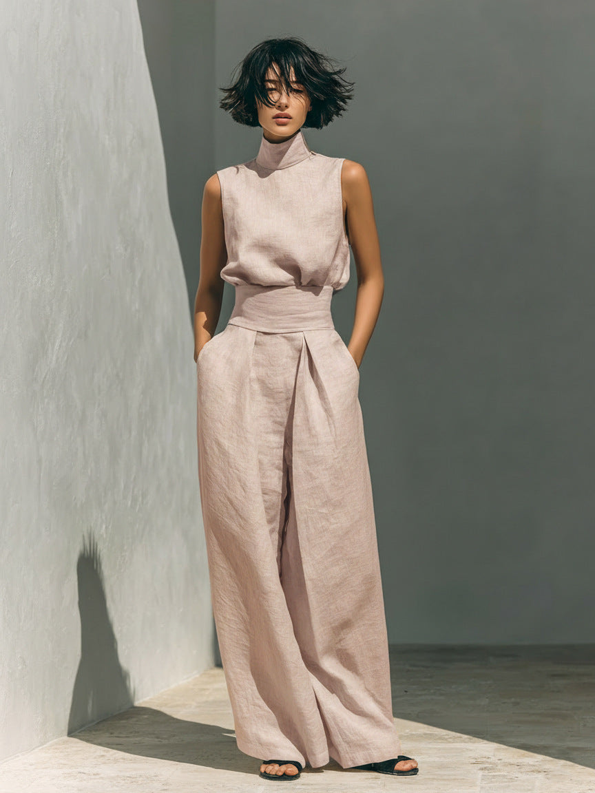Model wearing Women’s Cotton Linen Two-Piece Set – Sleeveless Top & Wide-Leg Pants in a minimalist setting.