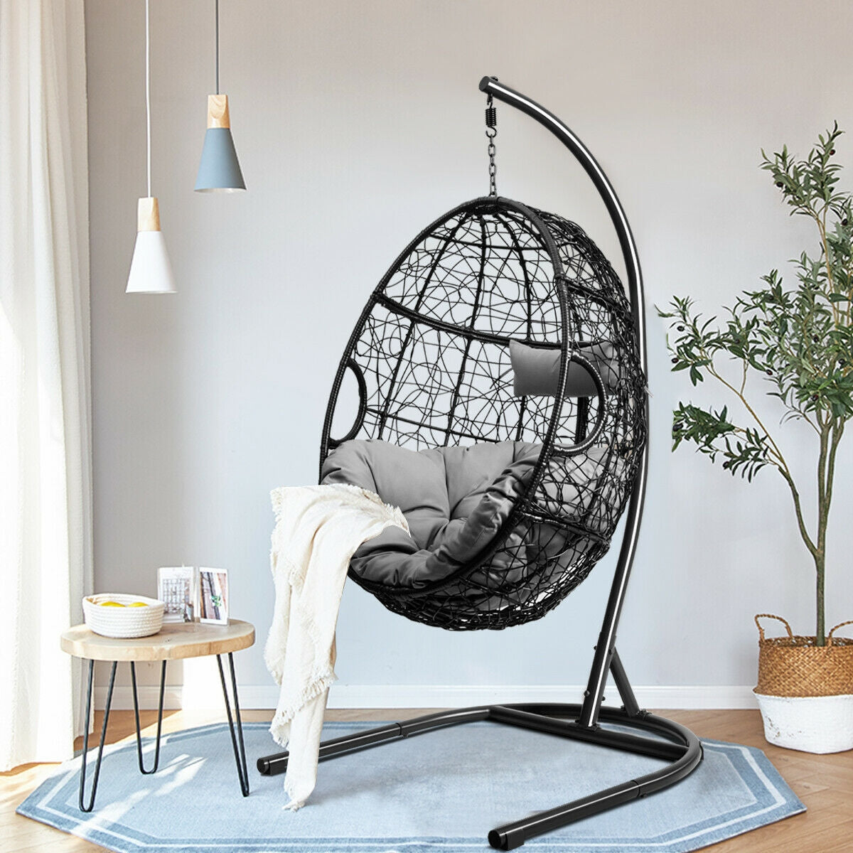 Hanging Cushioned Hammock Chair with Stand -Gray in living room setting, featuring sturdy frame, non-slip pads, and soft cushion.