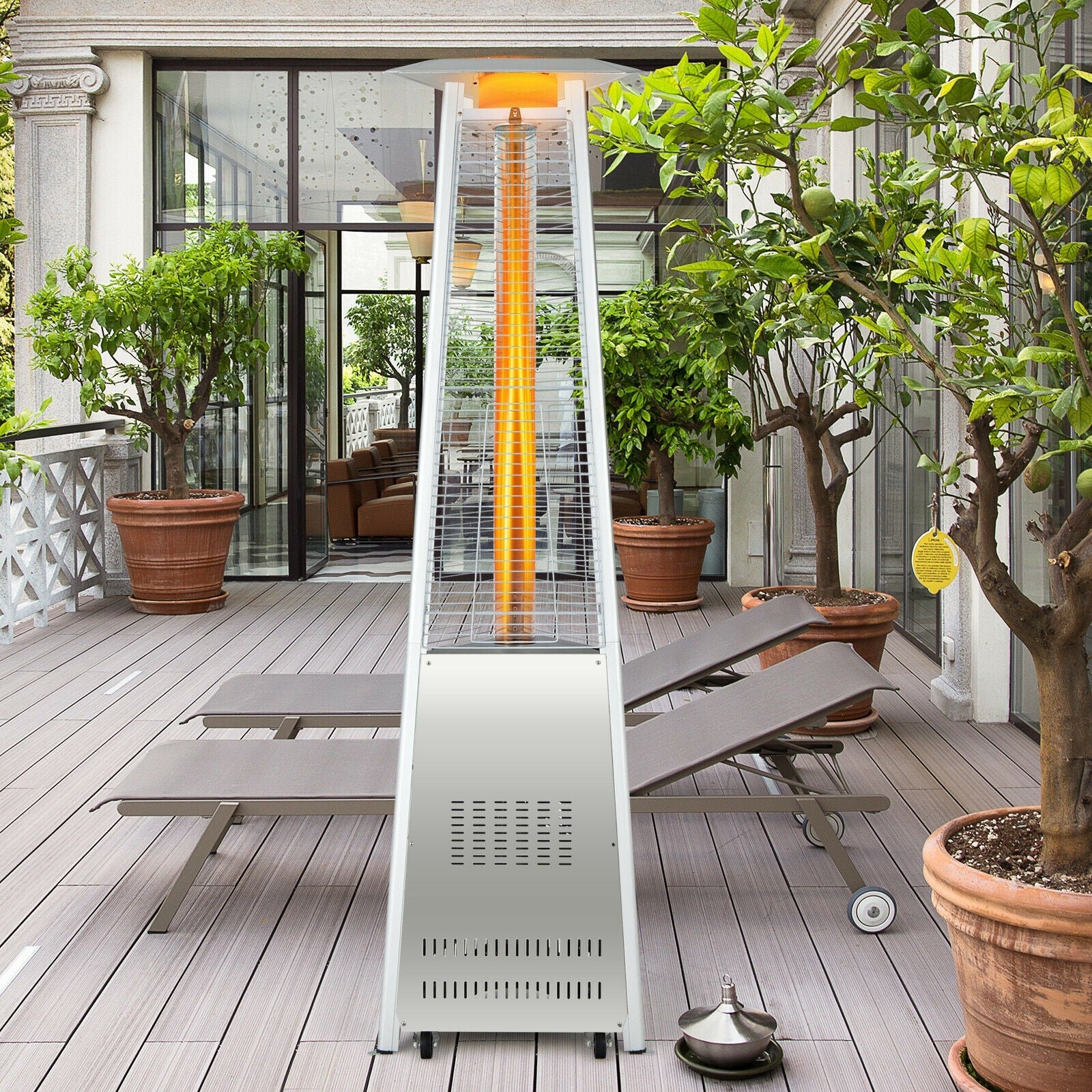 42 000 BTU Stainless Steel Pyramid Patio Heater With Wheels on a stylish outdoor patio