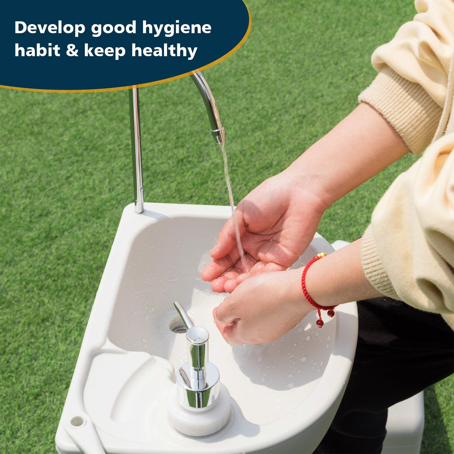 Person using Camping Hand Wash Station Basin Stand with 4.5 Gallon Tank for hygiene on grass outdoors.