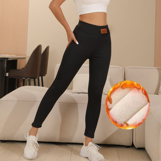 Women’s Plus Size Thermal Yoga Set | 4-Piece Activewear Outfit for curvy women, showcasing thermal pants in black with warm lining detail