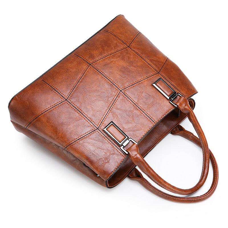 Luxury 3 Piece Leather Tote Set | Genuine Leather Cowgirl Shoulder Bag & Clutch in a classic brown design with silver accents.