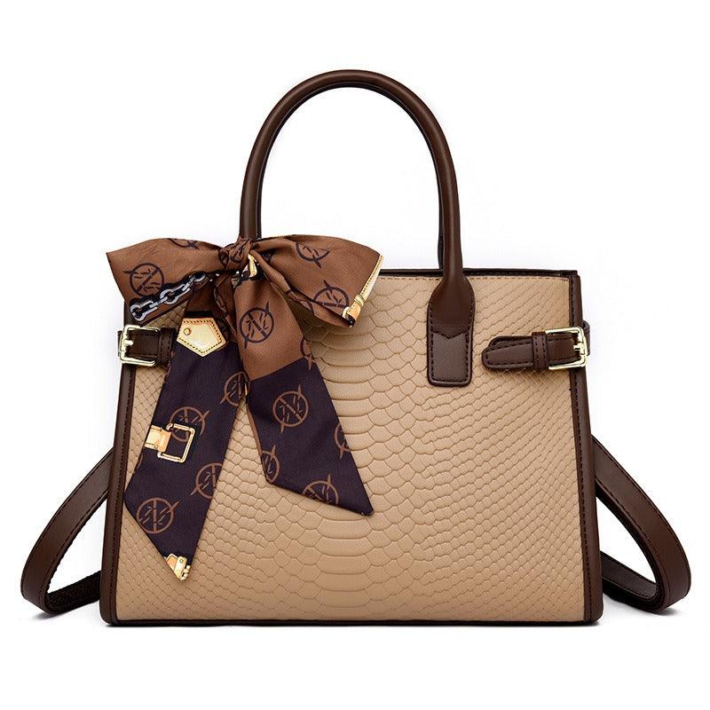 Serpent Luxe Snakeskin Handbag - Elegant Leather Commuter Bag for Stylish Women with snakeskin texture, brown scarf accent