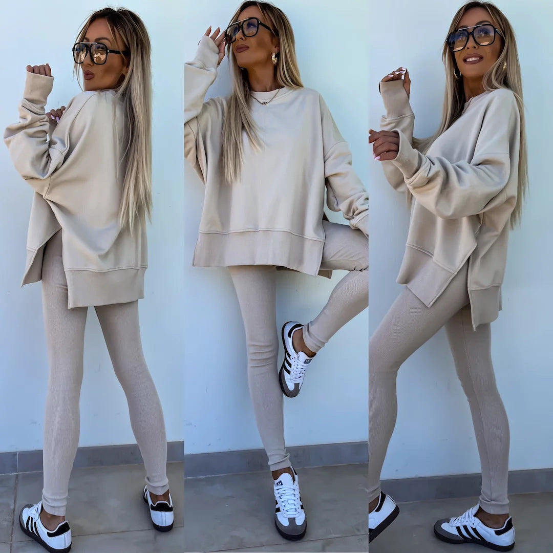 Woman wearing Women’s Casual Sweater Suit – Loose Split Top & Fitted Trousers Set, showcasing casual fall fashion.