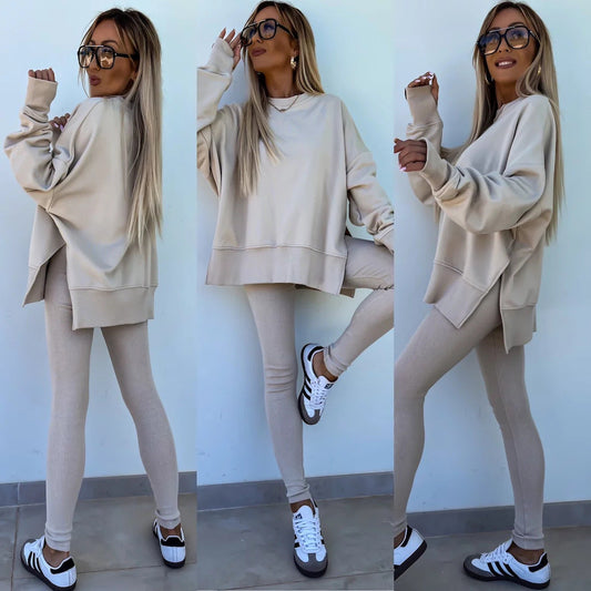 Woman wearing Women’s Casual Sweater Suit – Loose Split Top & Fitted Trousers Set, showcasing casual fall fashion.