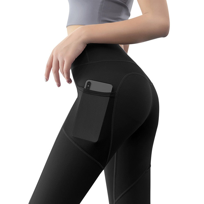 Close-up of Yoga Leggings with Phone Pocket featuring stylish spliced pattern and side phone pocket, ideal for active workouts.