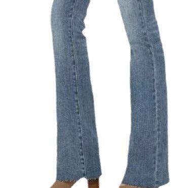 High Waist Slim Fit Stonewashed Jeans – The Perfect Cowgirl Fit in dark blue denim.