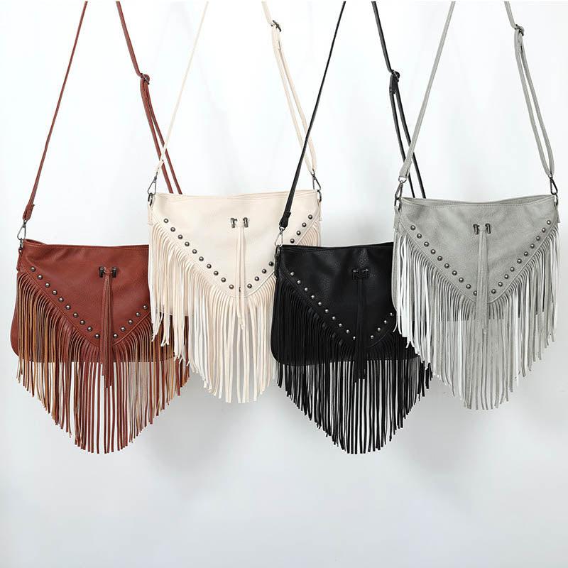 Trendy Riveted Tassel Shoulder Bag – Stylish and Practical Handbag with Tassels and Rivets in assorted colors.