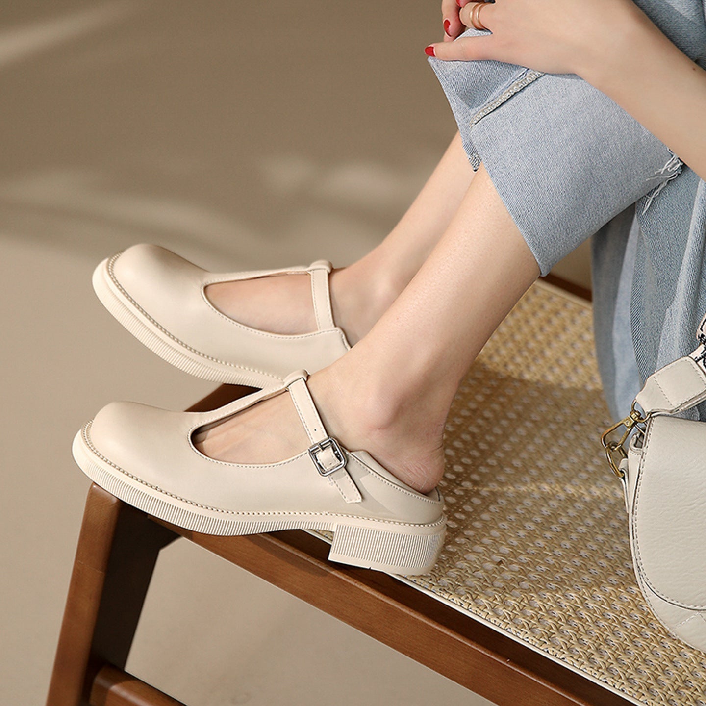 Milky White Women’s Shallow-Mouth Mary Jane Shoes with classic strap and flat heel, perfect for a vintage look.