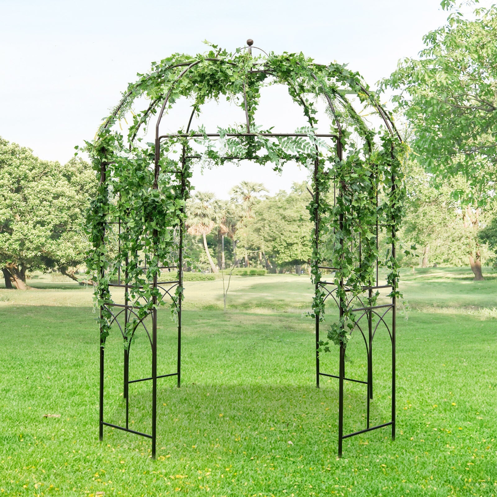 8.4 x 7 Feet Wide Birdcage Shape Garden Arbor with climbing plants in a lush green garden