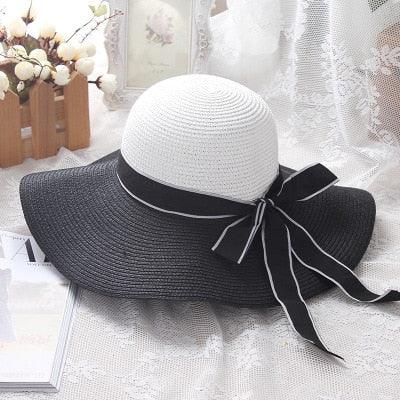 Audrey Hepburn Inspired Sun Hat – Elegant and Stylish for Cowgirl Women with black-and-white striped pattern and ribbon bow.