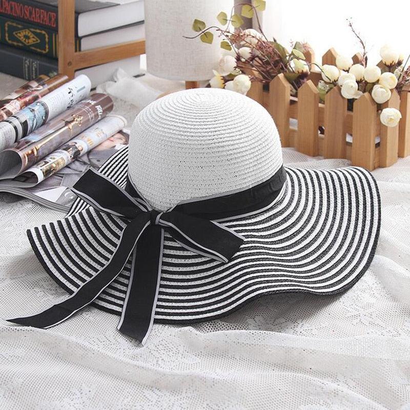 Audrey Hepburn Inspired Sun Hat – Elegant and Stylish for Cowgirl Women with black-and-white stripes and ribbon bow.