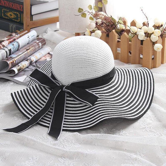 Audrey Hepburn Inspired Sun Hat – Elegant and Stylish for Cowgirl Women with black-and-white stripes and ribbon bow.