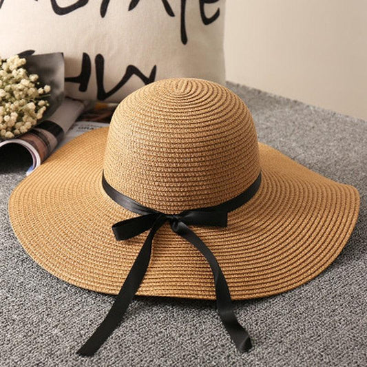 La Dolce Vita Straw Hat - Stylish Italian Summer Sun Hat with Ribbon Tie on display, showcasing elegant design and sun protection.