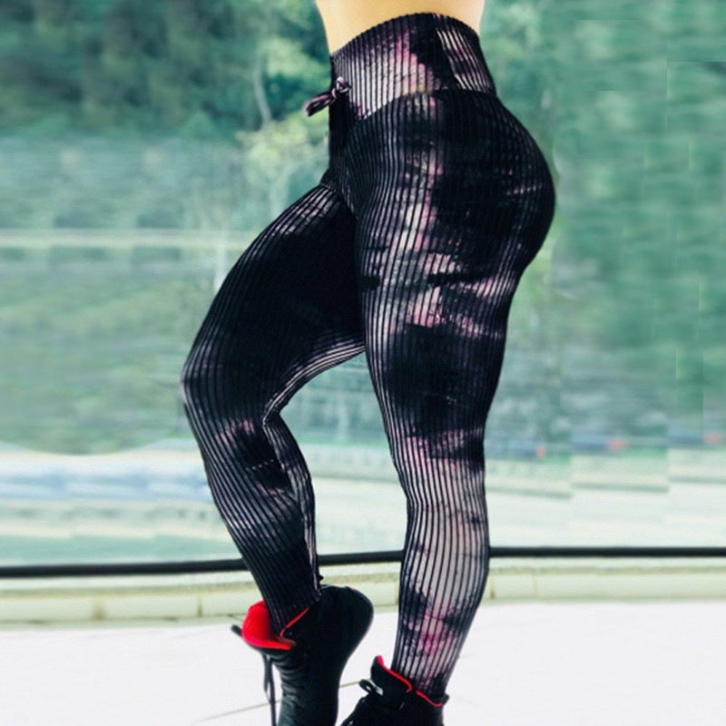 Woman wearing Printed High-Waist Leggings – Stretchy & Stylish Workout Wear with vibrant prints, ideal for gym or yoga.