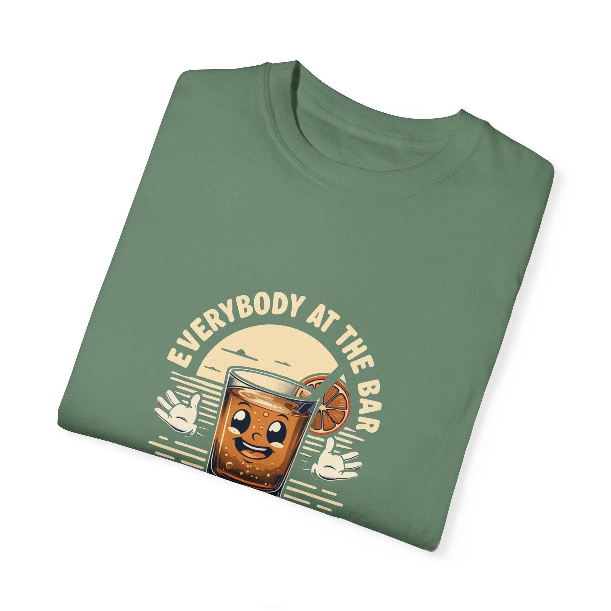 Everybody at the Bar Gettin Tipsy Unisex Garment-Dyed T-Shirt with playful whiskey glass graphic, folded on display.