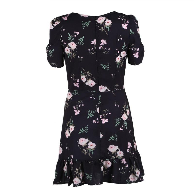 Back view of Boho Floral Summer Dress with black base and floral pattern, perfect for stylish comfort in warm weather.