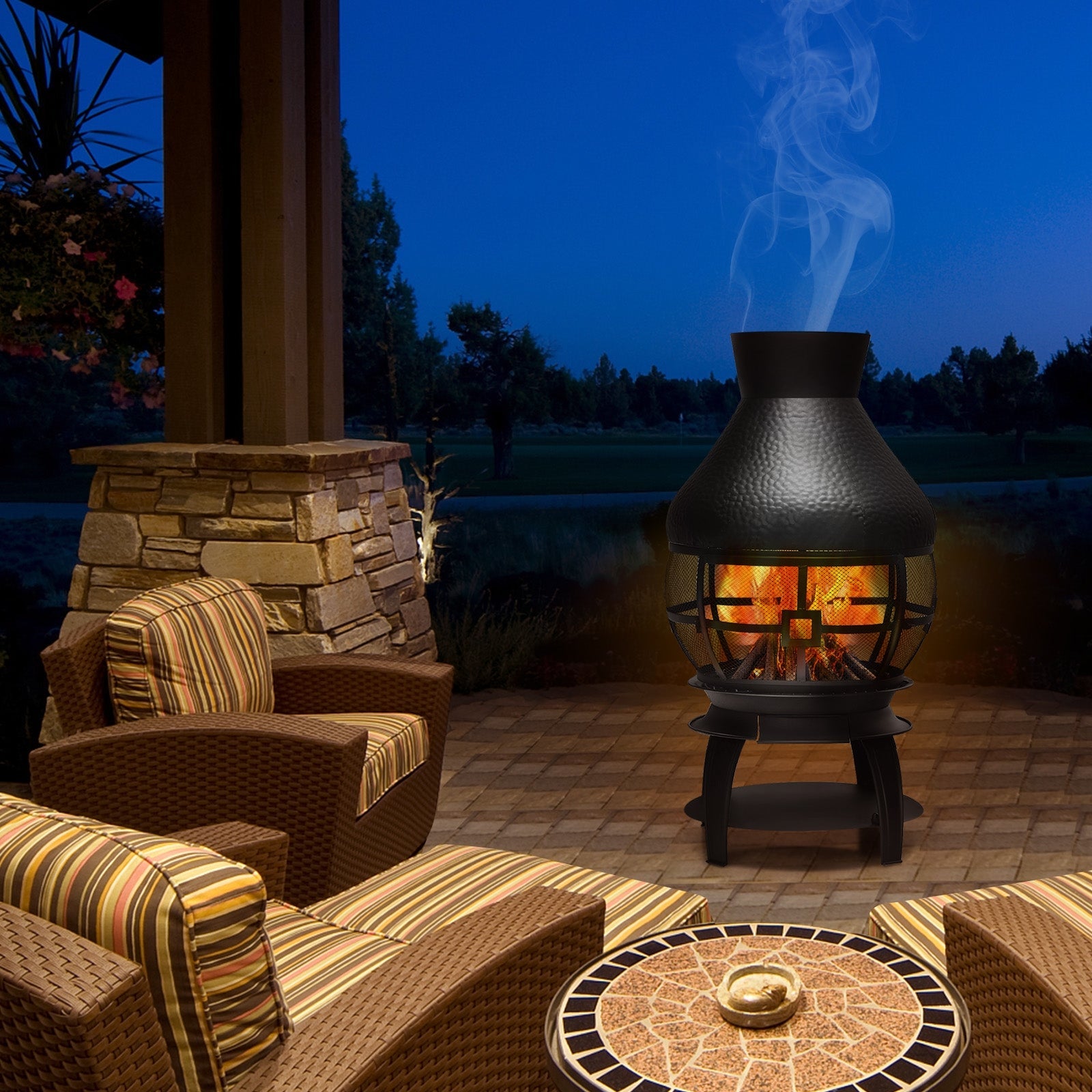 Patio Wood Burning Chimneys Fireplace with cast iron build on outdoor deck at night