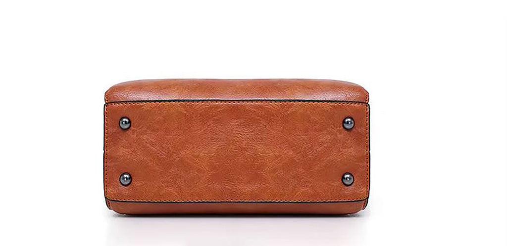 Bottom view of the Vintage Leather 4-Piece Messenger Bag Set | Luxury Leather Tote, Clutch & Wallet Set showcasing durable craftsmanship.