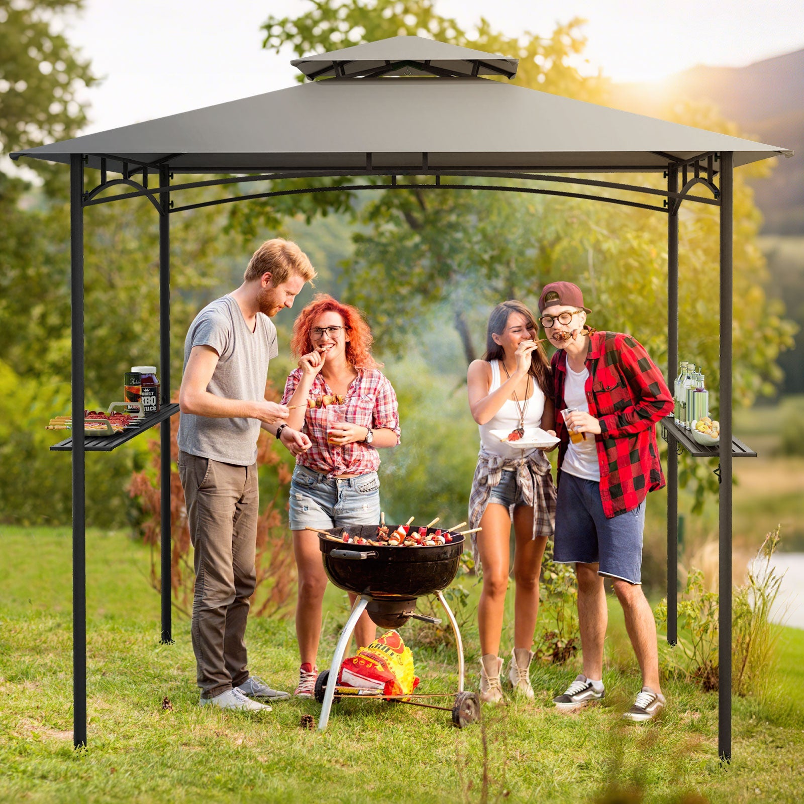 Enjoy a barbecue under the 8 x 5 Feet Grill Gazebo with 2 Shelves 6 Hooks and Metal Frame-Gray on a sunny day.