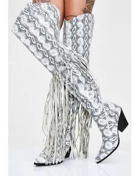 Vintage Fringe Over-the-Knee Boots with Western flair and chunky heels, featuring a unique pattern and playful fringe detailing.