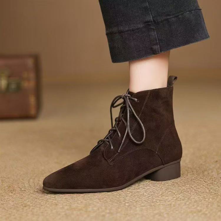 Woman wearing Maillard Matte Pointed Low-Heel Ankle Boots Women showcasing elegant design and comfort