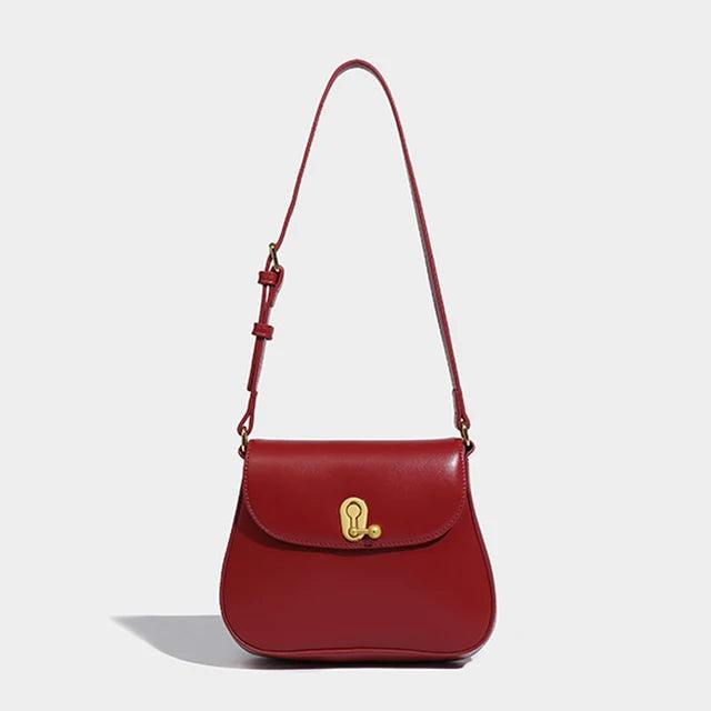 Luxury Retro Cowgirl Saddle Bag | Genuine Leather Brown Handbag with a classic design and adjustable strap.