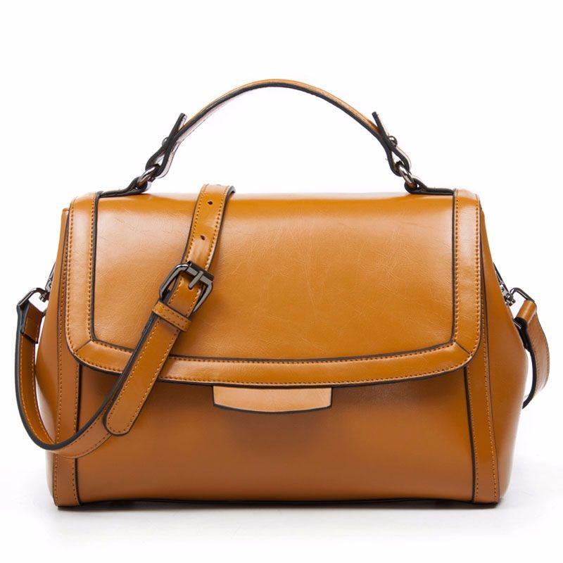 Luxury Genuine Leather Fashion Handbag for Cowgirls - Premium Black & Retro Brown displayed on white background.