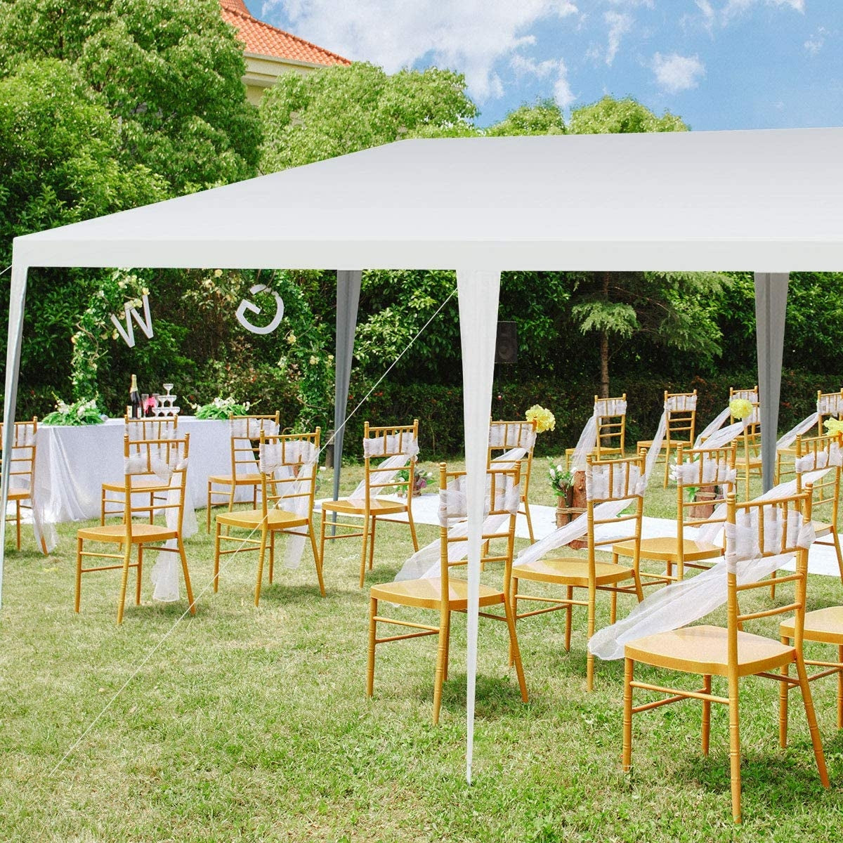 10 x 20 Feet Waterproof Canopy Tent with Tent Peg and Wind Rope set up for an outdoor wedding, providing shade and durability.