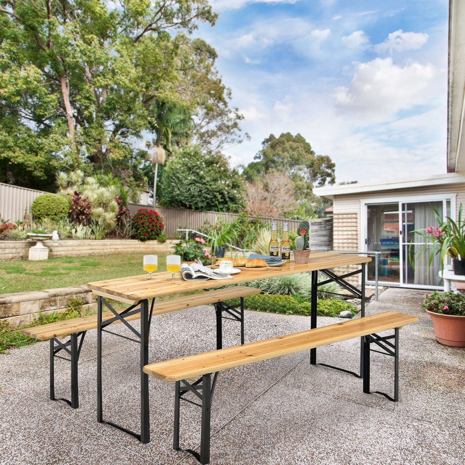 3 Pieces Folding Wooden Picnic Table Bench Set in a garden, featuring sturdy fir wood and steel, ideal for indoor or outdoor use.