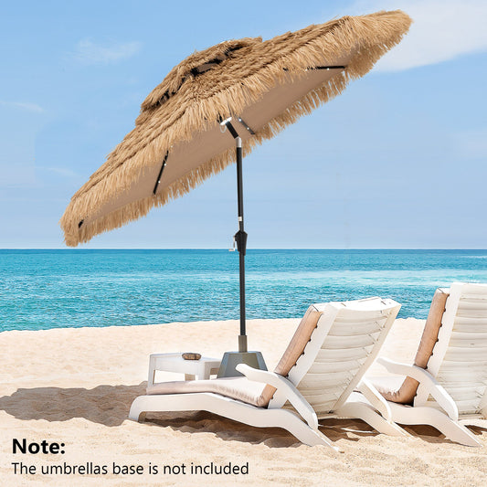 9 Feet Solar Powered Thatched Tiki Patio Umbrella with Led Lights on a beach with sun loungers, ocean view in the background