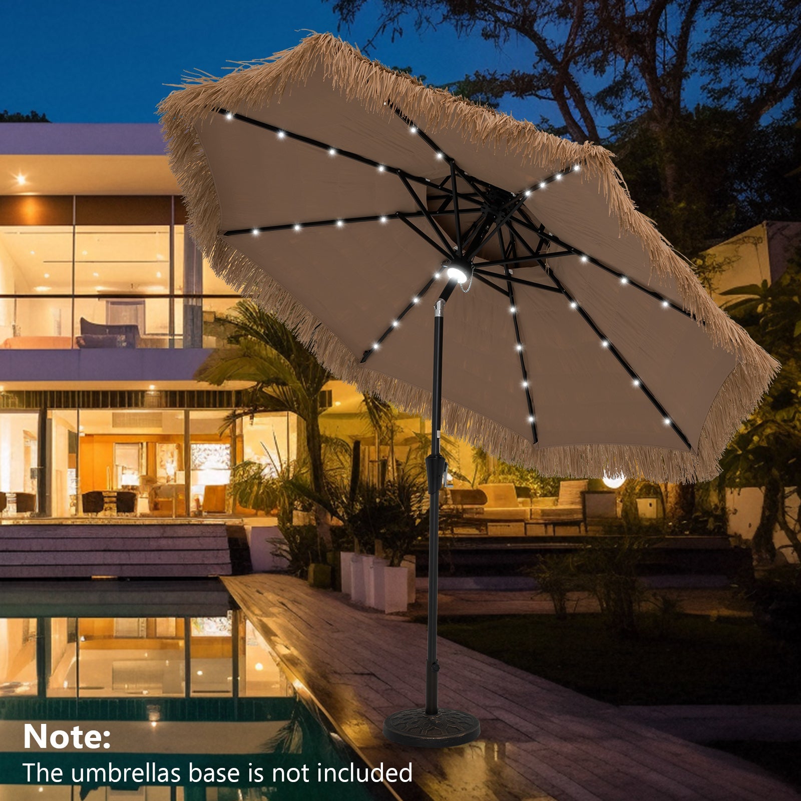 9 Feet Solar Powered Thatched Tiki Patio Umbrella with Led Lights, poolside at night, illuminated with LED lights.