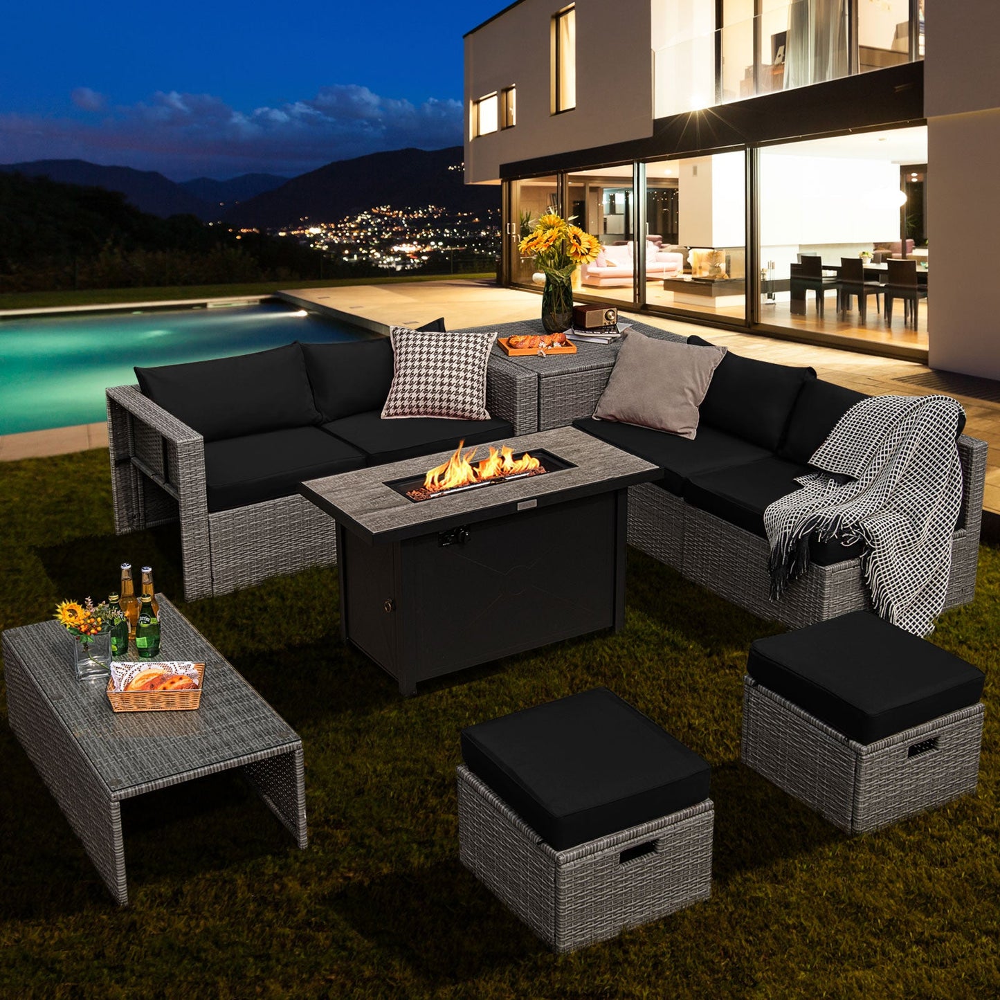 9 Pieces Patio Furniture Set with 42 Inches 60000 BTU Fire Pit-Black by a poolside at night
