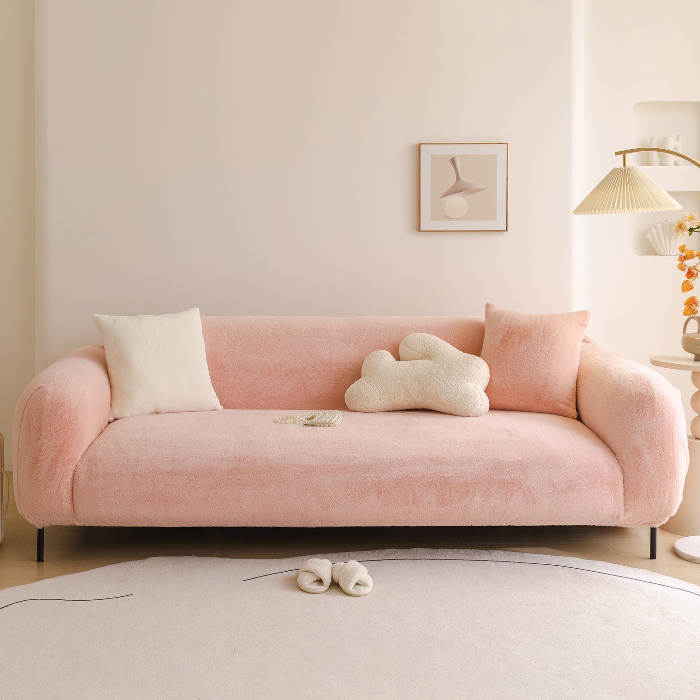 Soft Plush Warm Sofa Cover Stretchable Cozy Velvet Couch Protector for Fall & Winter on a pink couch in a cozy room setting.