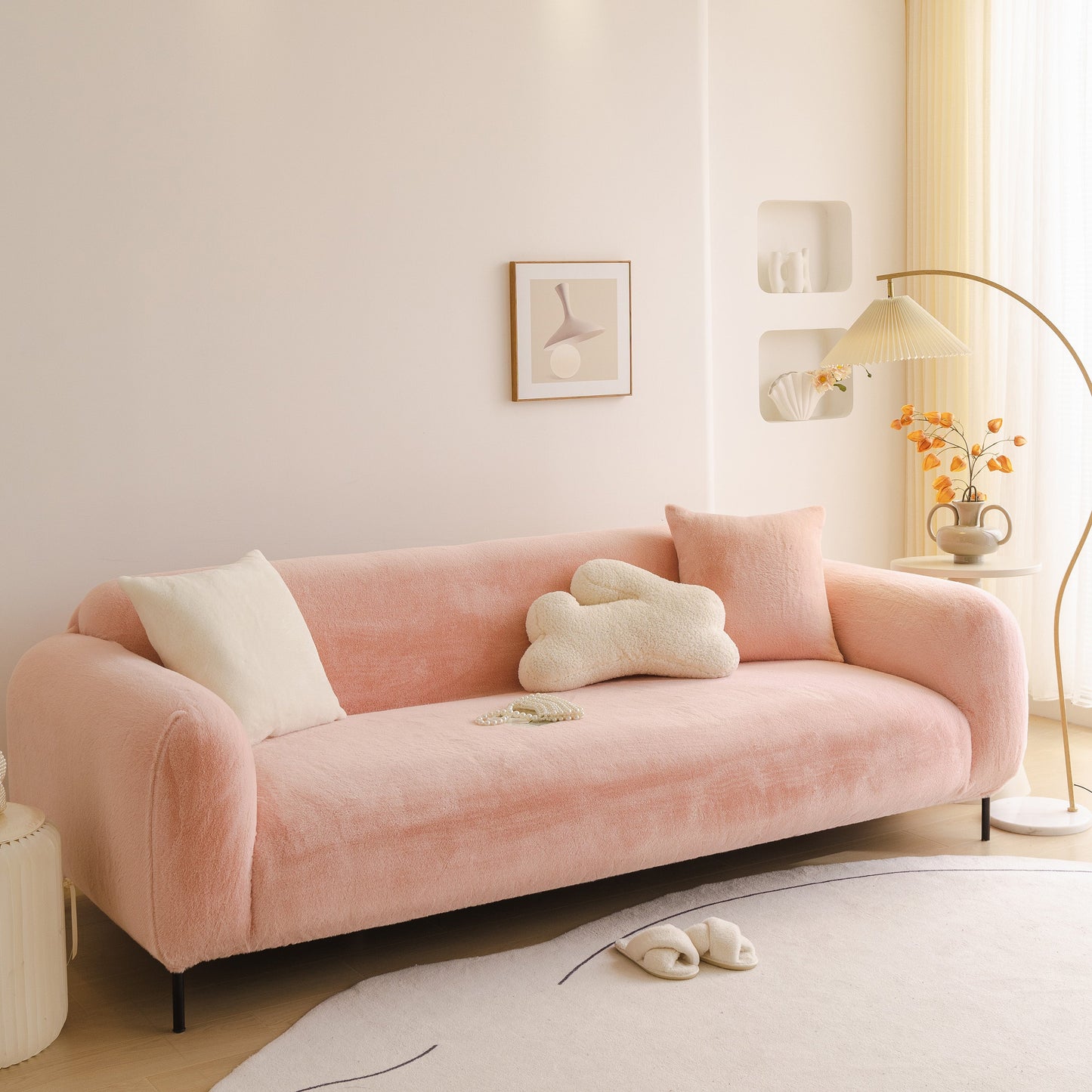 Soft Plush Warm Sofa Cover Stretchable Cozy Velvet Couch Protector for Fall & Winter on a pink sofa in a cozy living room.