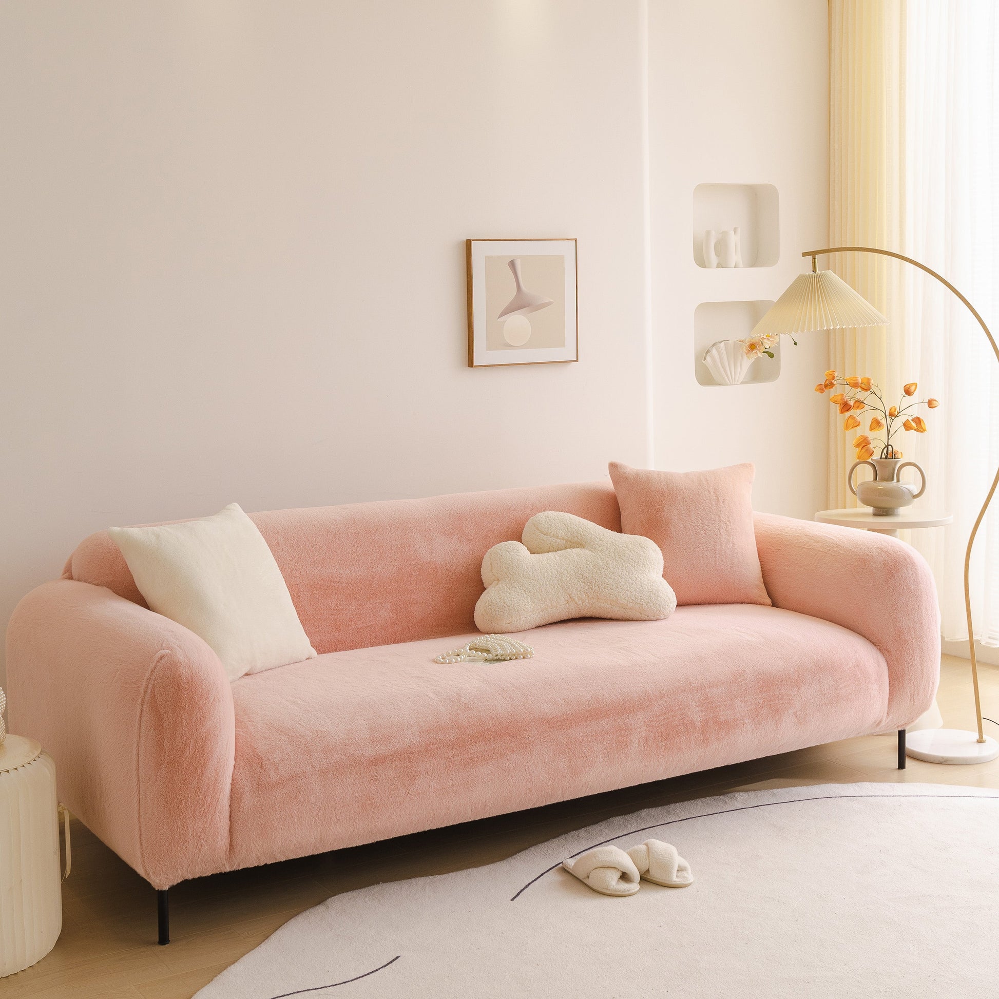 Soft Plush Warm Sofa Cover Stretchable Cozy Velvet Couch Protector for Fall & Winter on a pink sofa in a cozy living room.