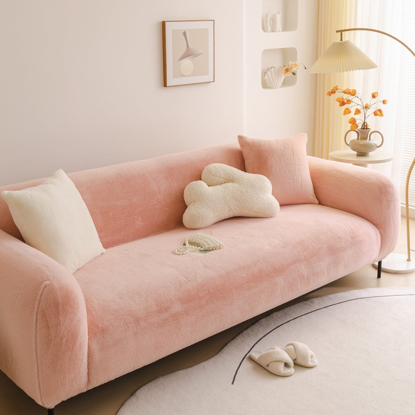Soft Plush Warm Sofa Cover Stretchable Cozy Velvet Couch Protector for Fall & Winter on a stylish modern pink sofa.
