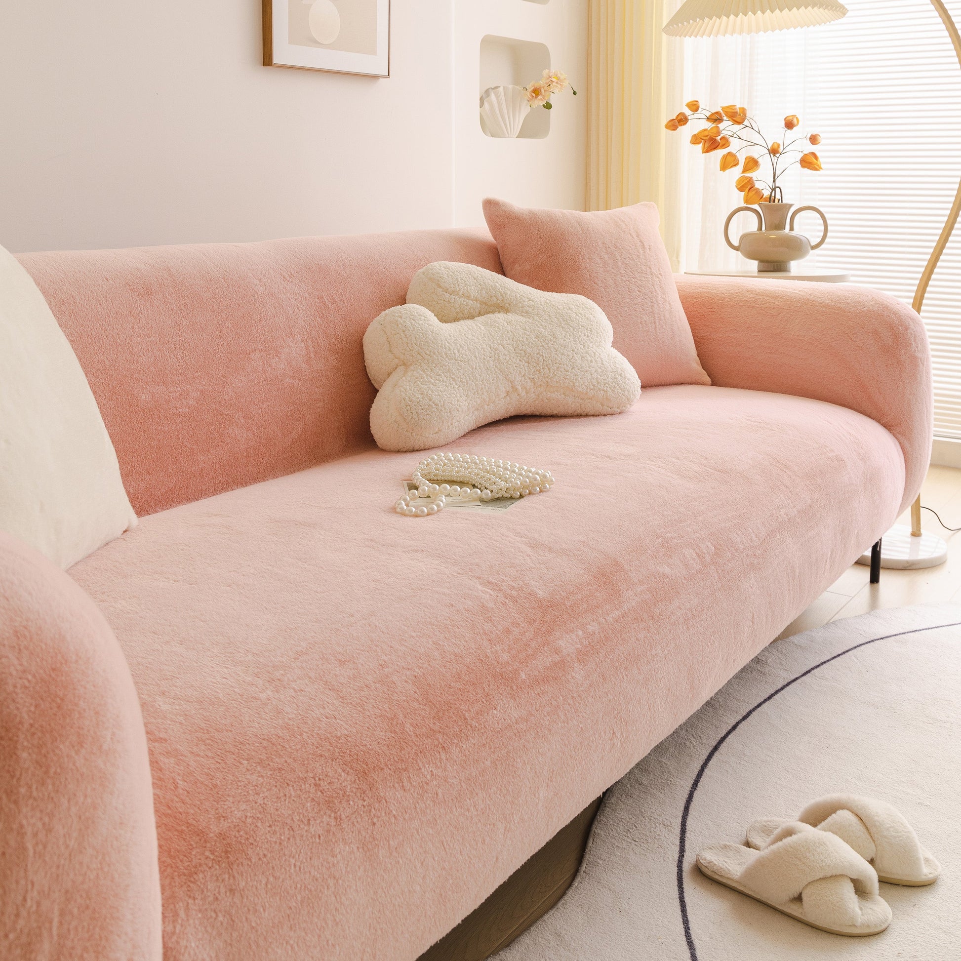 Soft Plush Warm Sofa Cover Stretchable Cozy Velvet Couch Protector for Fall & Winter displayed on a comfy pink sofa