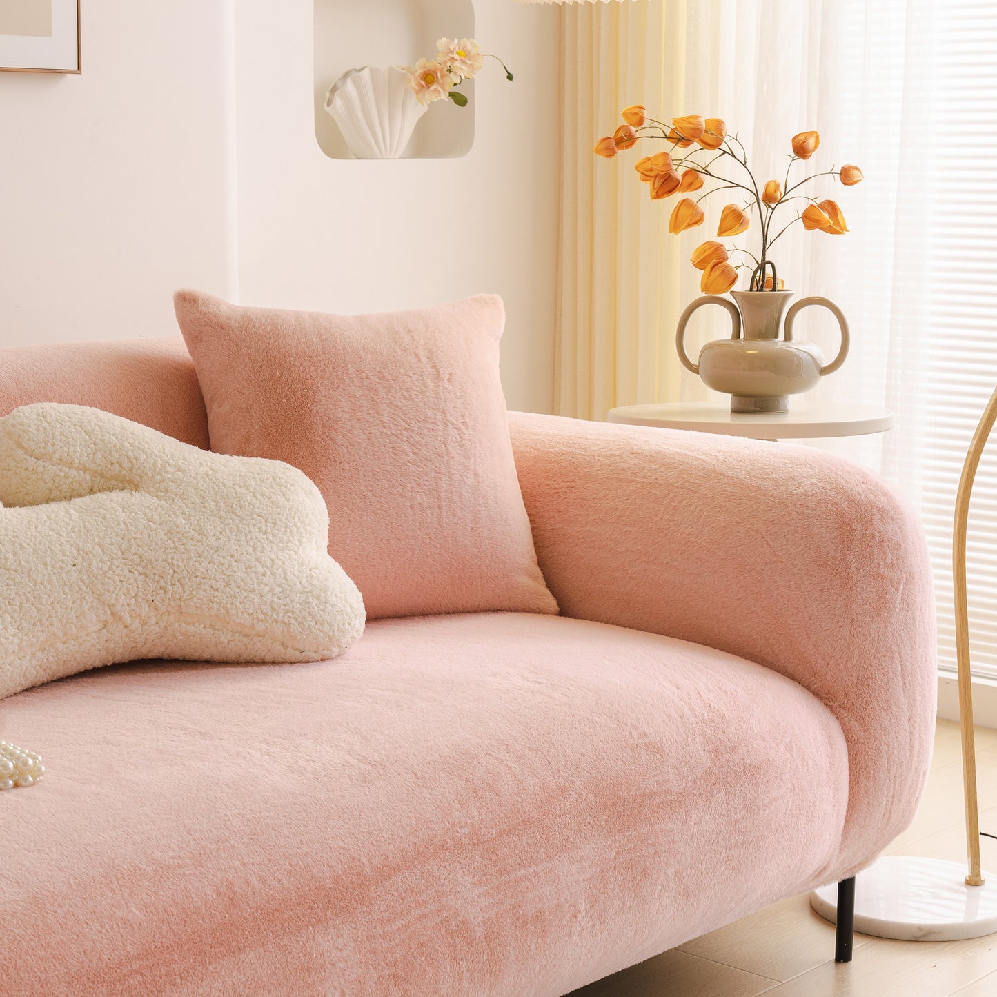 Soft Plush Warm Sofa Cover Stretchable Cozy Velvet Couch Protector for Fall & Winter displayed on a modern pink sofa.