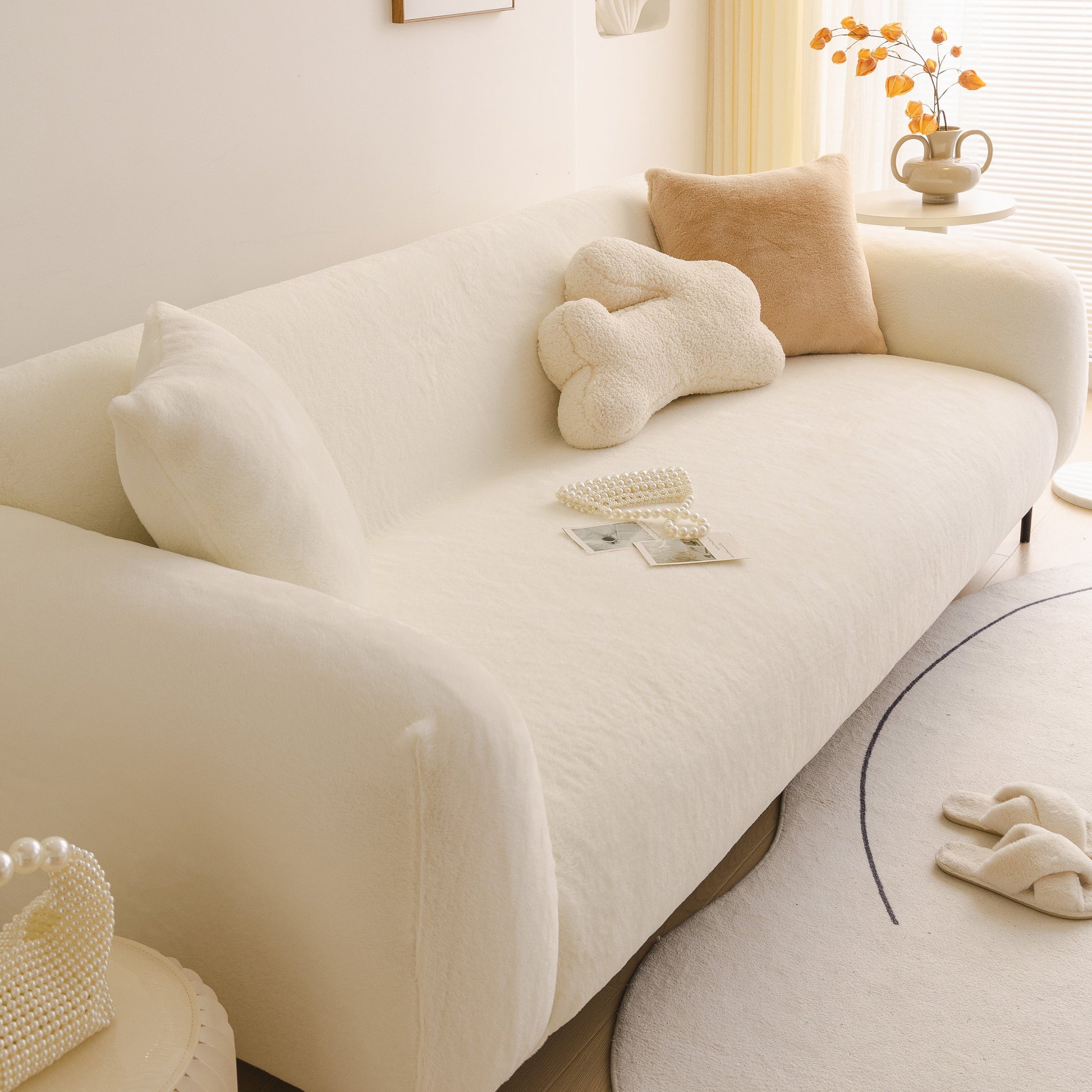 Soft Plush Warm Sofa Cover Stretchable Cozy Velvet Couch Protector for Fall & Winter on a cream-colored couch in a cozy room