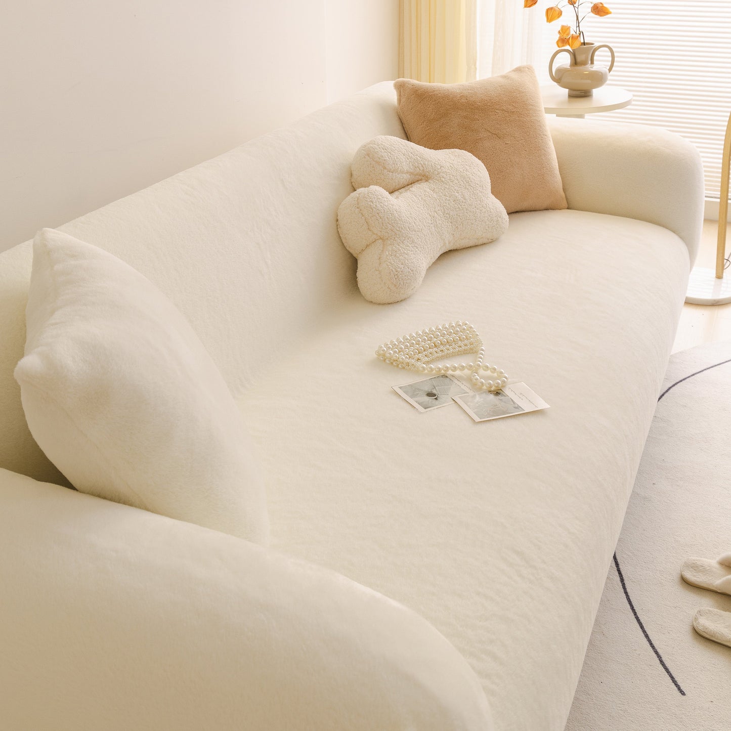 Soft Plush Warm Sofa Cover Stretchable Cozy Velvet Couch Protector for Fall & Winter on a sofa with decorative pillows.