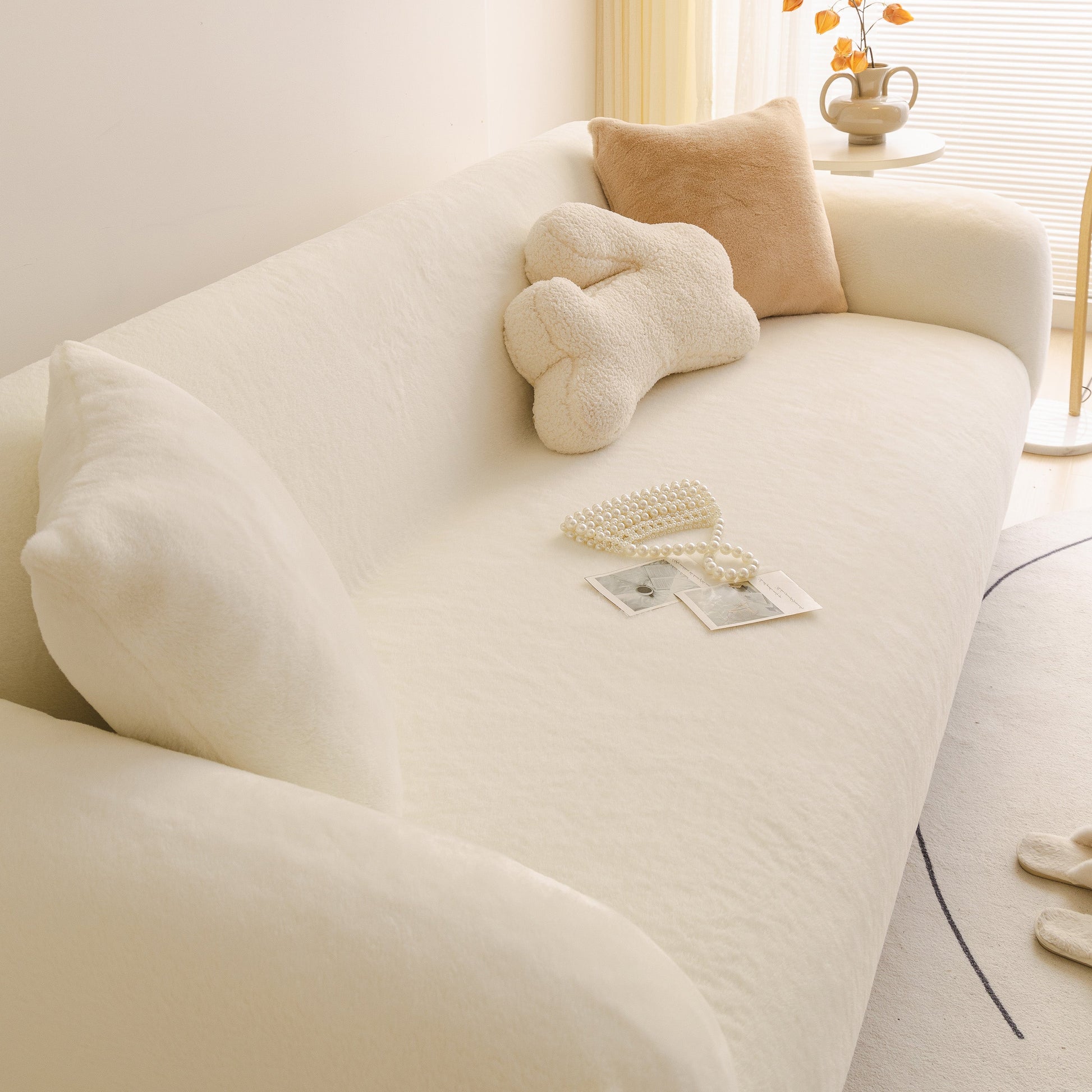 Soft Plush Warm Sofa Cover Stretchable Cozy Velvet Couch Protector for Fall & Winter on a sofa with decorative pillows.