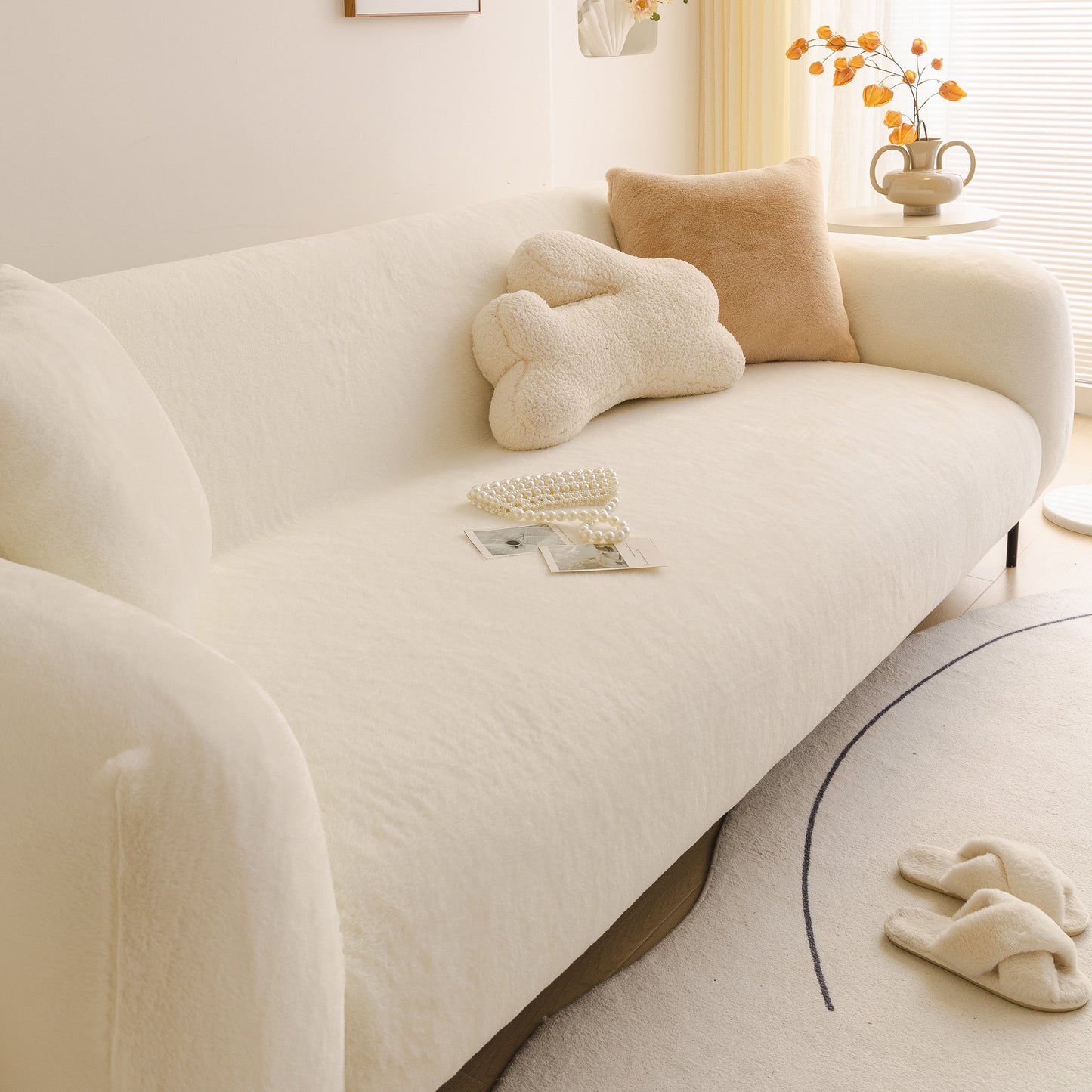 Soft Plush Warm Sofa Cover Stretchable Cozy Velvet Couch Protector for Fall & Winter on a white couch with decorative pillows.
