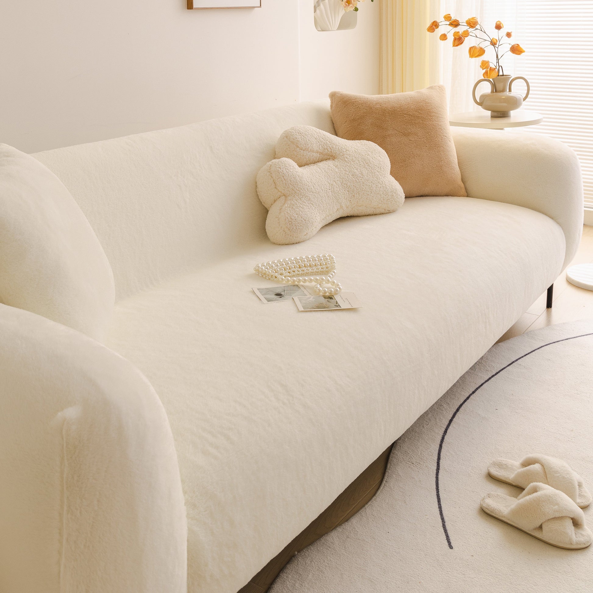 Soft Plush Warm Sofa Cover Stretchable Cozy Velvet Couch Protector for Fall & Winter on a white couch with decorative pillows.