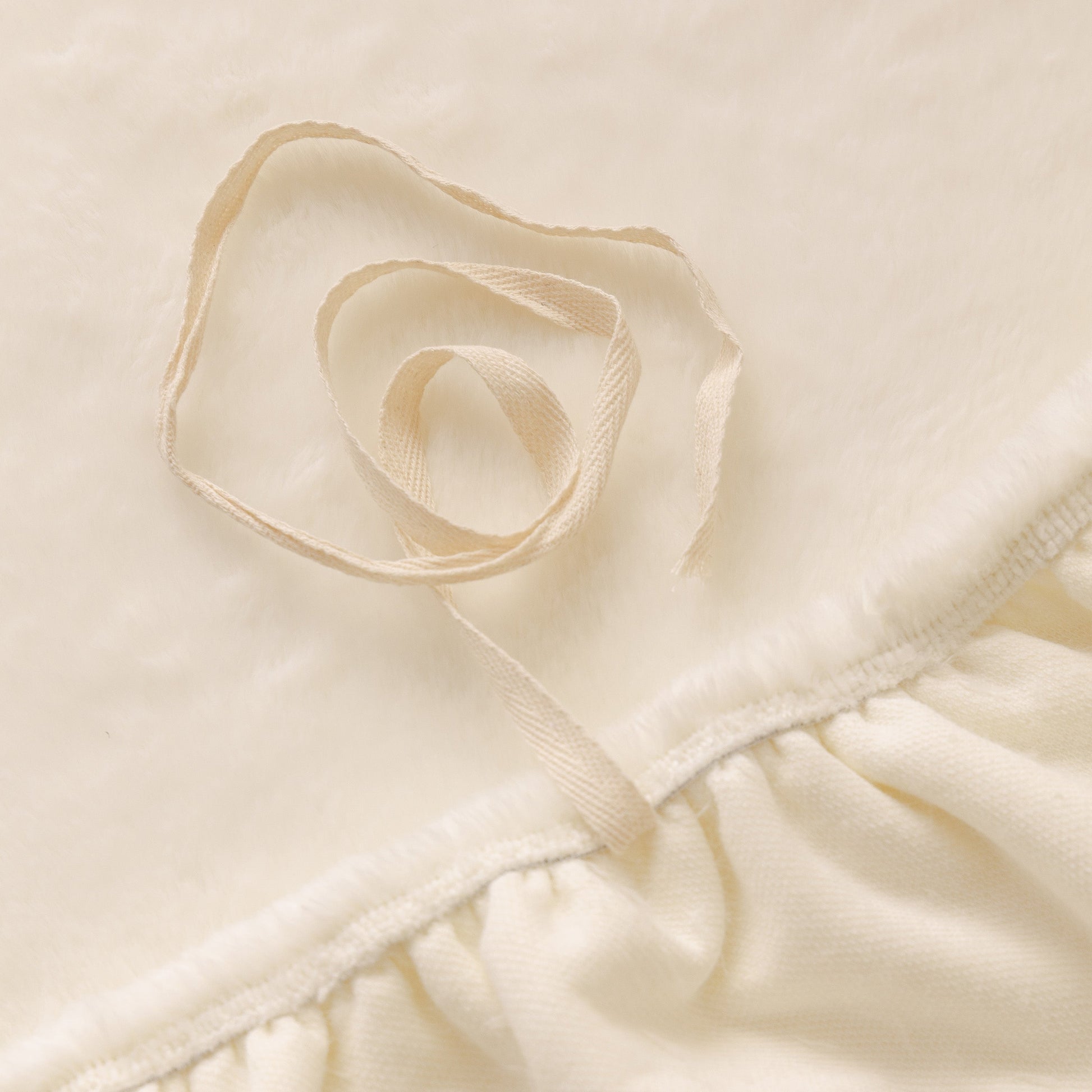 Close-up of Soft Plush Warm Sofa Cover Stretchable Cozy Velvet Couch Protector for Fall & Winter showing texture and stitching details